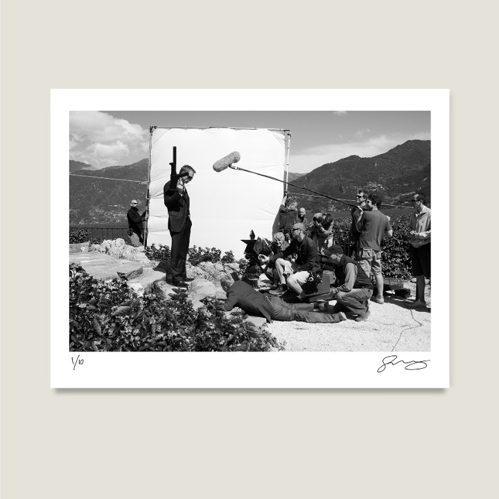 Daniel Craig as James Bond about to deliver his famous “Bond, James Bond” line in the final scene of Casino Royale, Villa Gaeta, Lake Como, Italy. Casino Royale, 2006. Archival pigment print on Hahnemühle Fine Art Baryta Satin 300gsm.

Signed Limited Edition Price increases with every sold unit.
