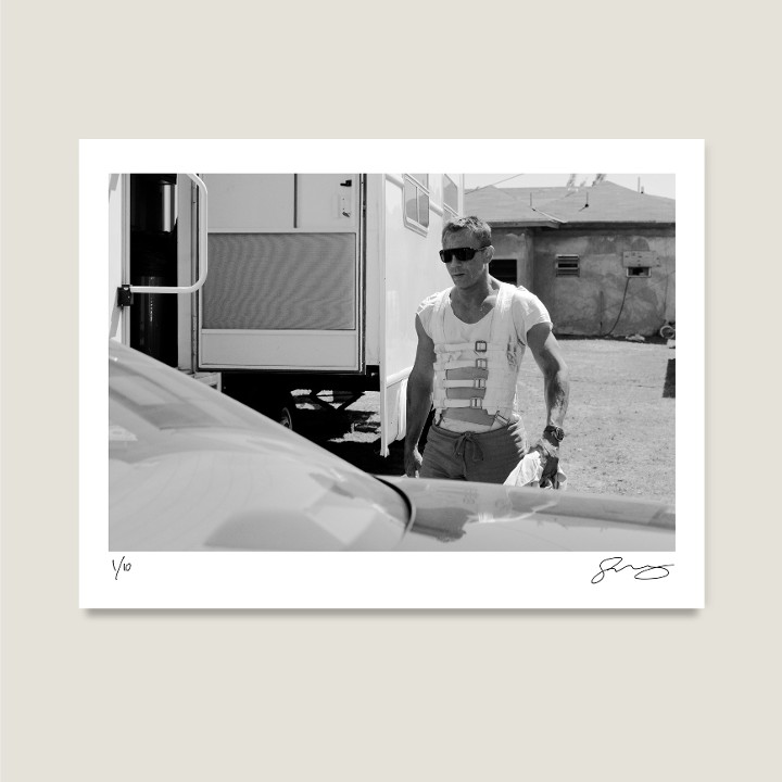 Daniel Craig in his stunt harness on location in Nassau, Bahamas. Casino Royale, 2006. Archival pigment print on Hahnemühle Fine Art Baryta Satin 300gsm.

Signed Limited Edition Price increases with every sold unit.