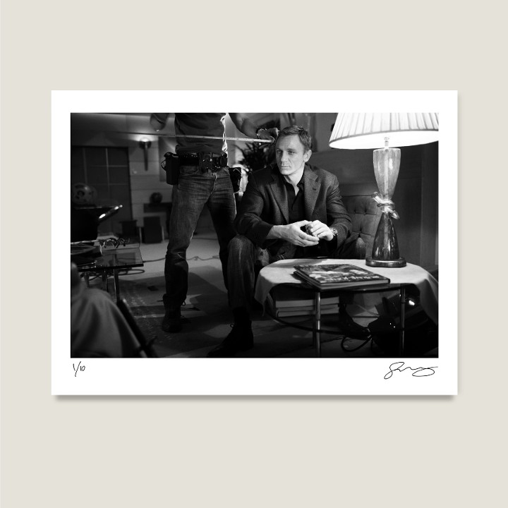 Daniel Craig on the set of M’s London apartment, shot in Prague, Czech Republic. Casino Royale, 2006. Archival pigment print on Hahnemühle Fine Art Baryta Satin 300gsm.

Signed Limited Edition Price increases with every sold unit.